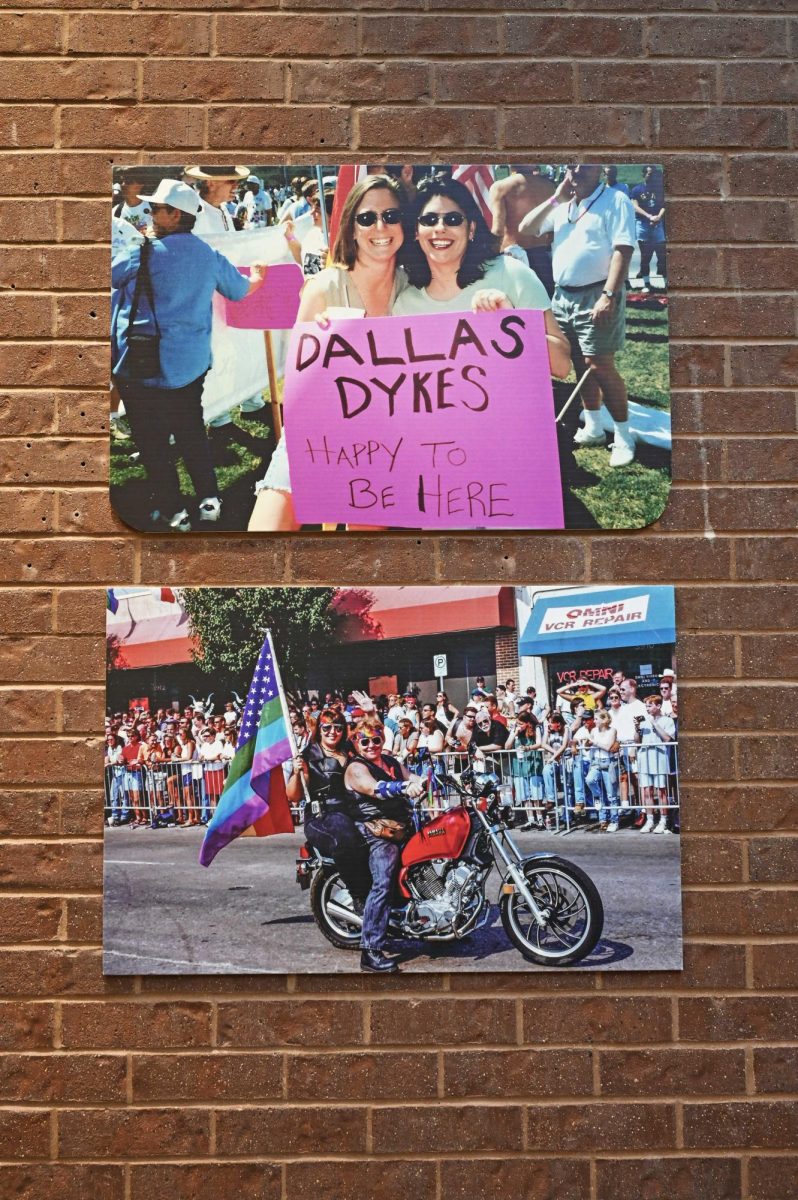 Photographs of attendees and participants at a Pride parade in downtown Dallas round out the display in the J Building gallery.