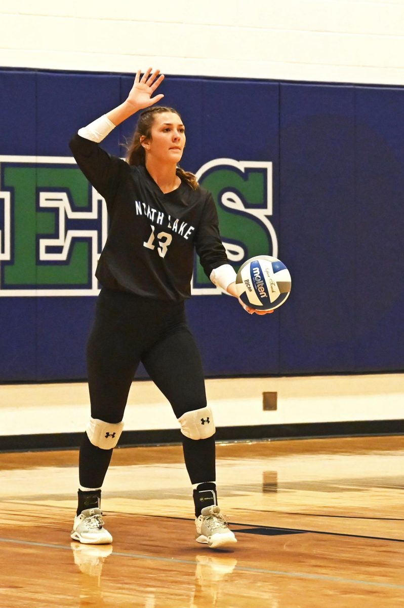 Hadley Klock, Blazer’s setter, dishes out a serve against Coffeyville
Community College during the Oct. 14 home game.
