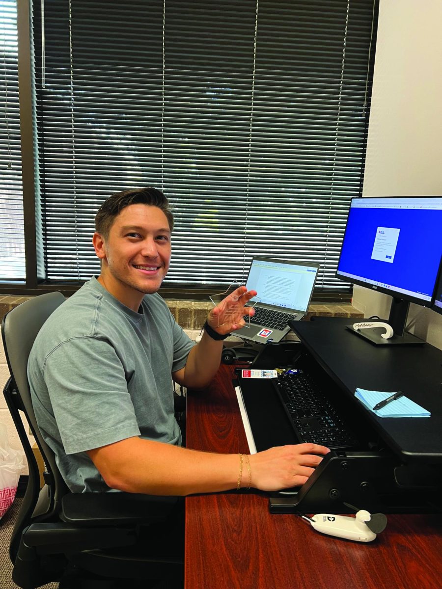 North Lake Campus Health Promotion Coordinator Jordan Rasch plans events in his office.