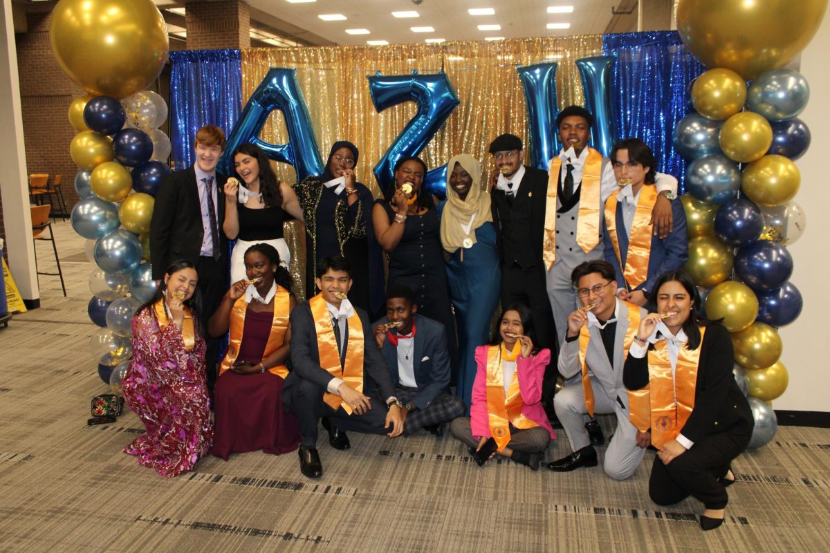 Outgoing and incoming officers of PTK - AZH chapter celebrate at their Induction