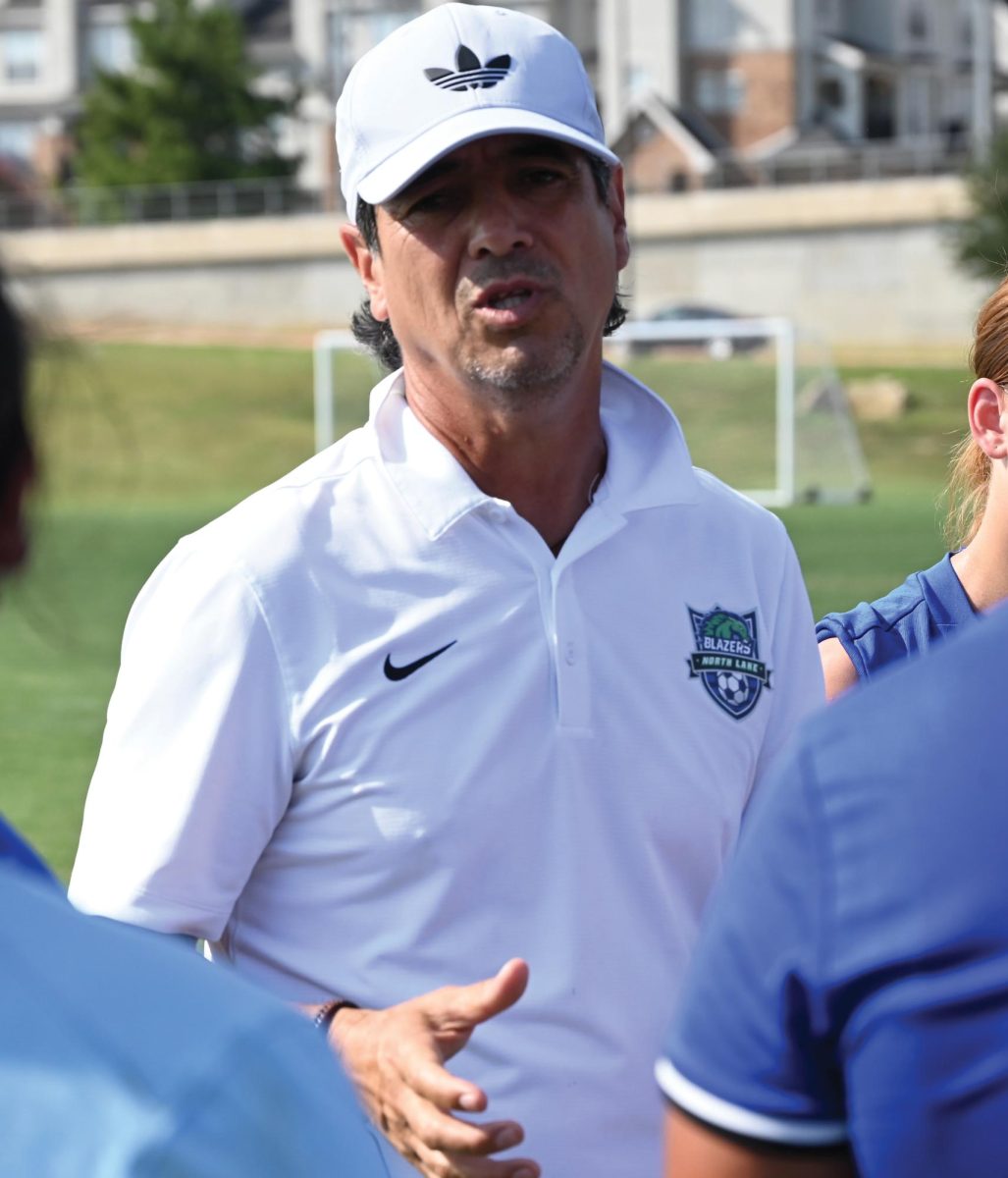 Coach Gonzalez encourages his team during the Blazers versus Bears soccer game on Sept. 12.