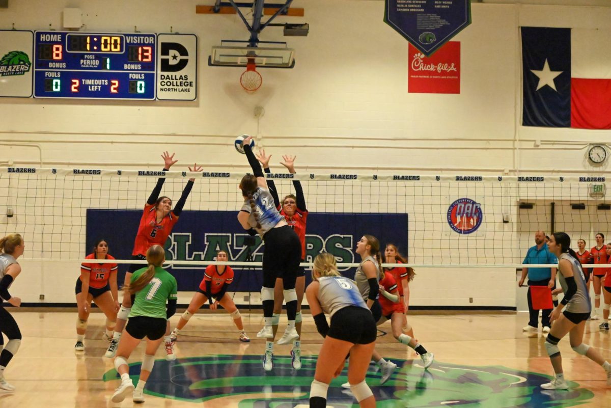 North Lake’s Hailey Pennison (#12) spikes the ball against Seminole State on Sept. 27.