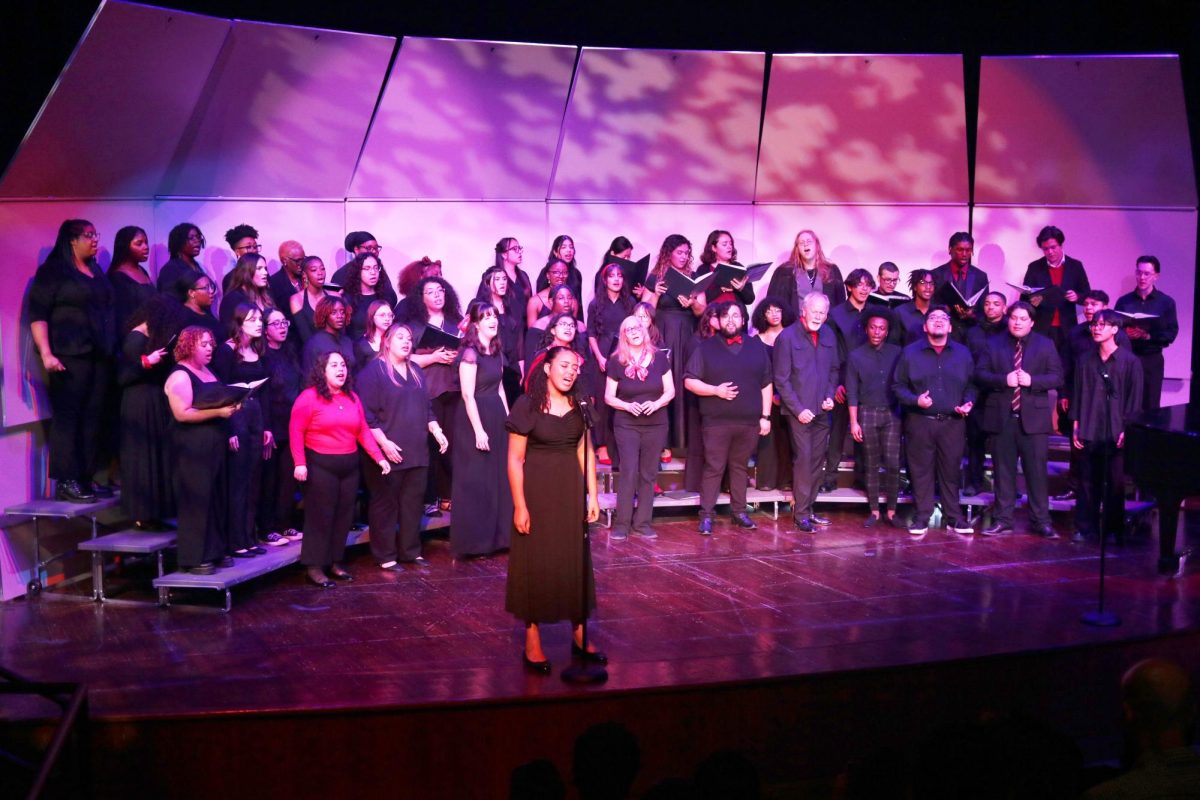 Soloist Rafaela de Araujo sings along with the full choir.