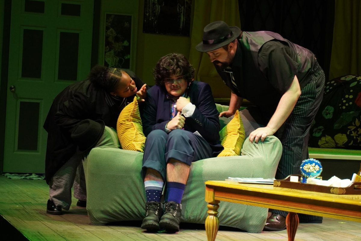 Bug (Jamiah Taylor) threatens Mustard (Camilo Ramos) with co-henchman Leslie (Sam Nuckolls).