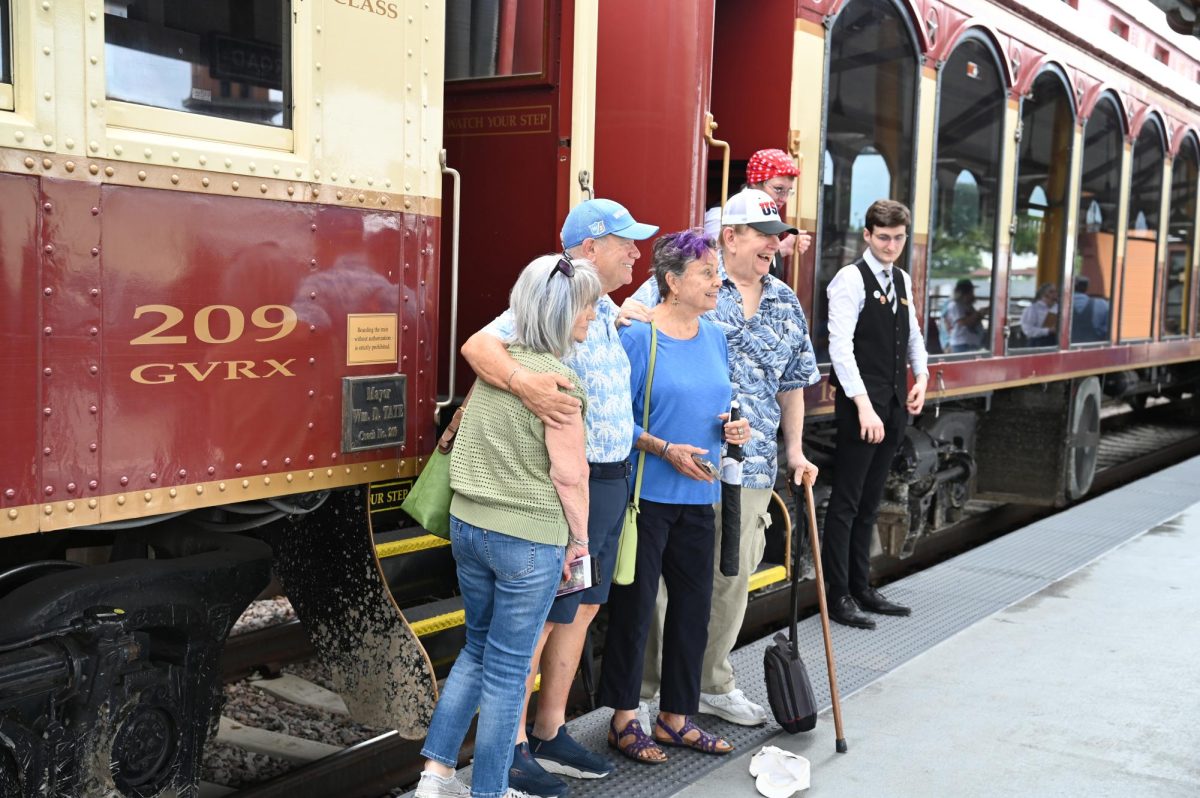 Grapevine Railroad passengers take pictures before boarding.